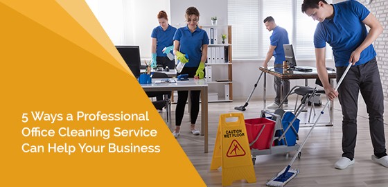 Group Of Janitors Cleaning The Modern Office